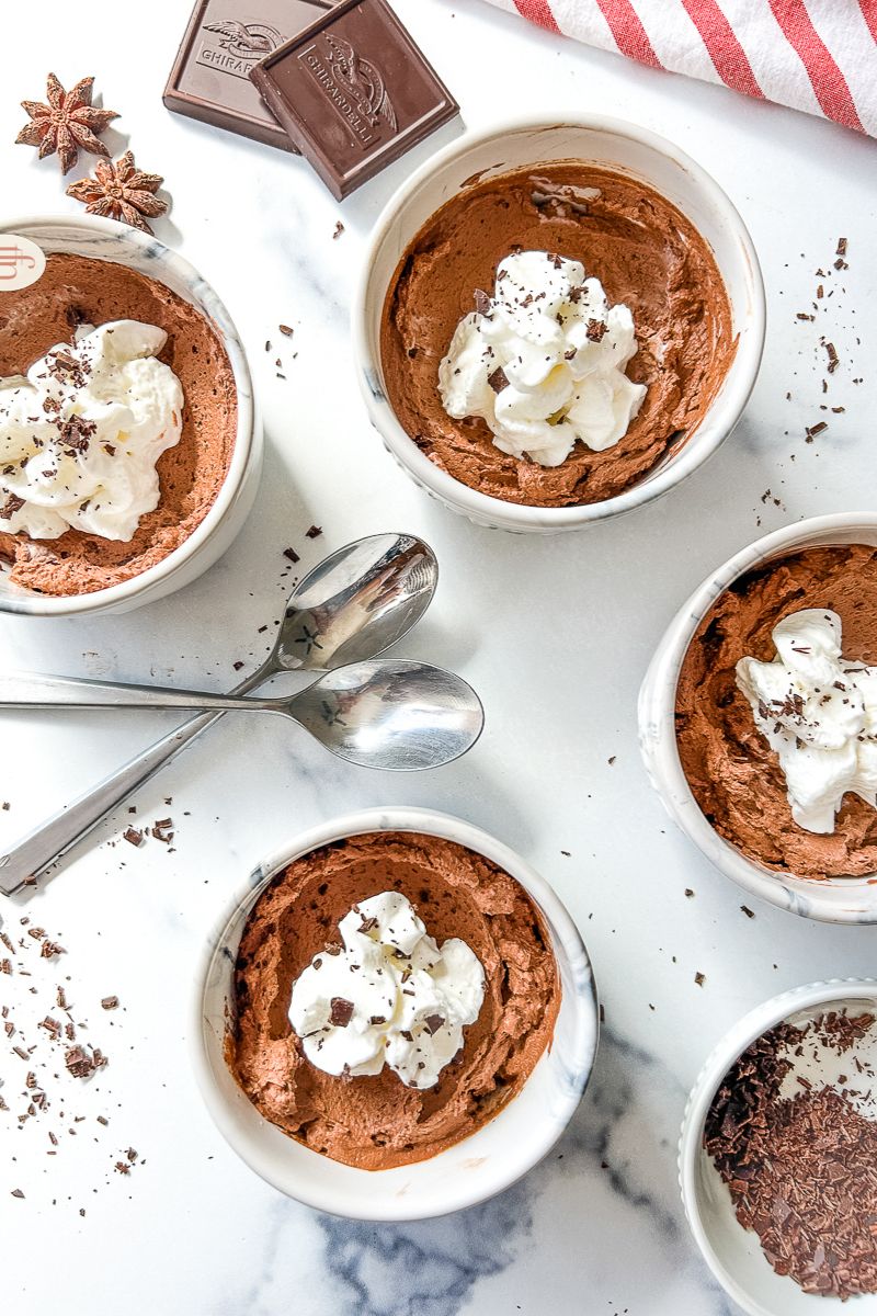 Four cups of chocolate mousse.