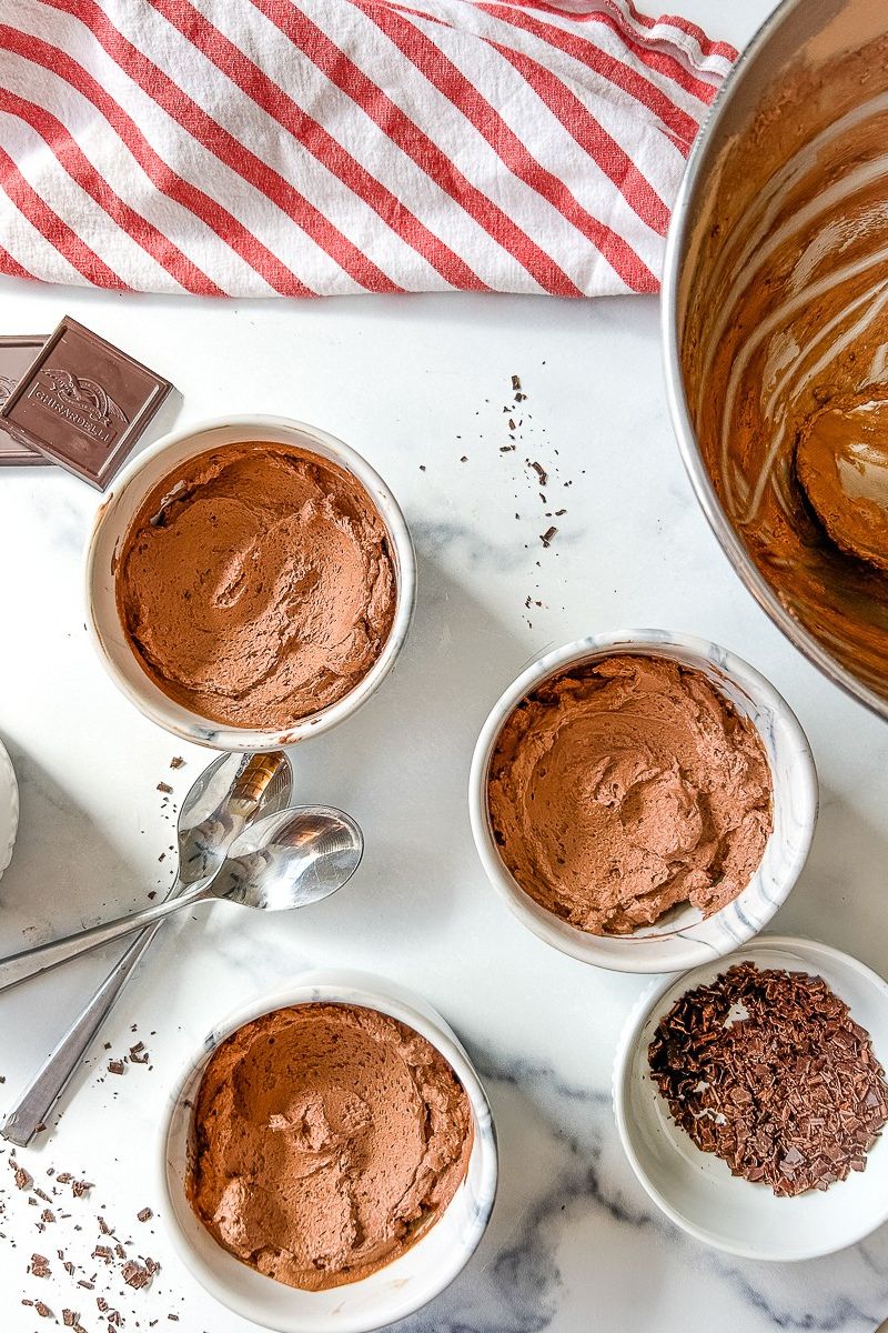 Three cups of chocolate mousse.