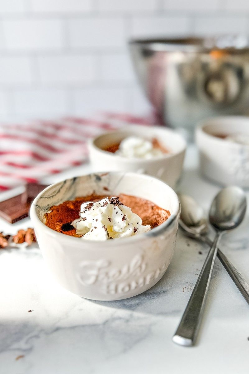 Three cups of chocolate mousse.