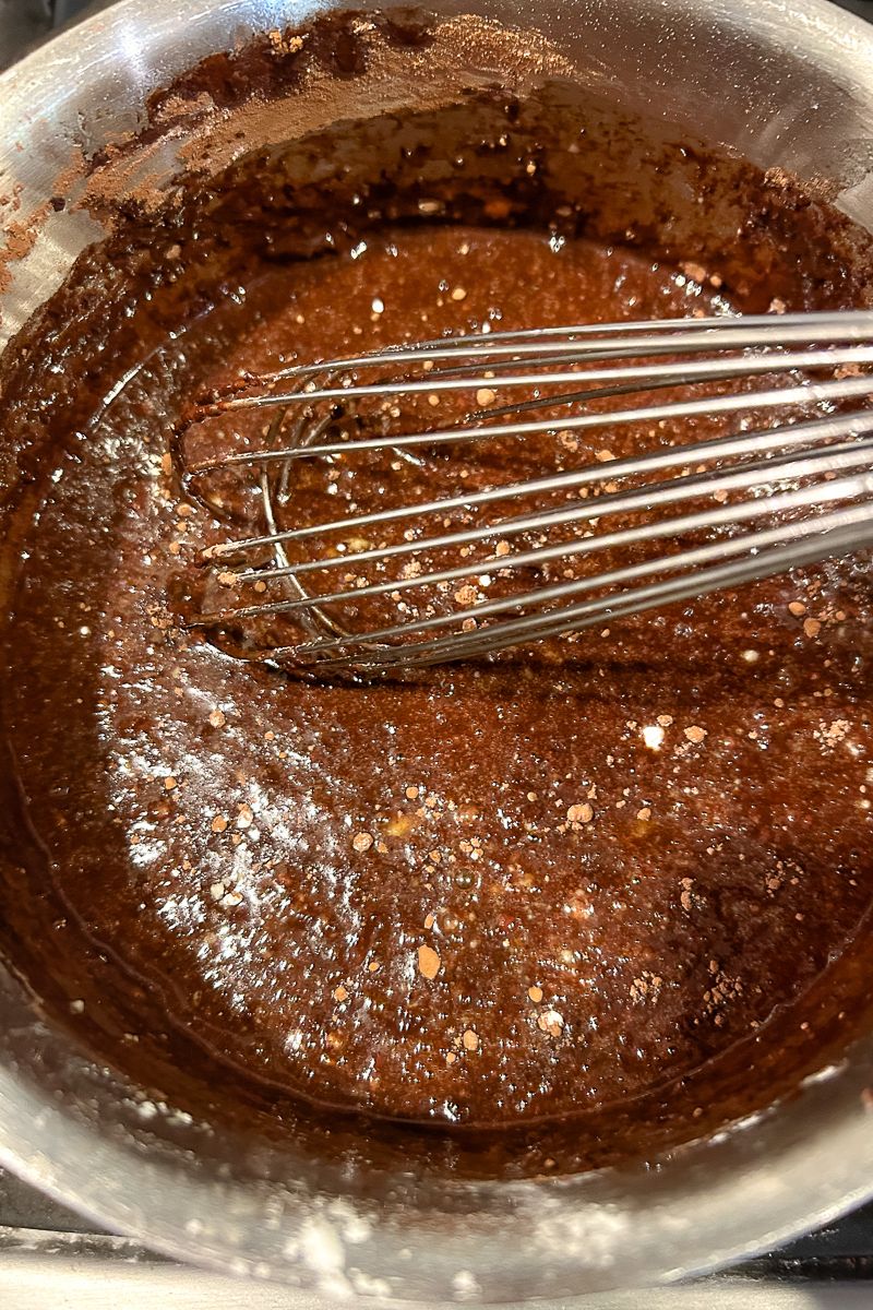 A bowl of chocolate cake batter.