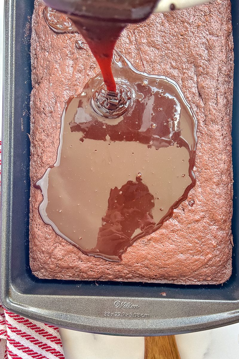 A pan of chocolate cake with a chocolate toppings.