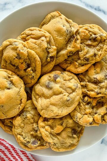 A plate of chocolate chip cookies.