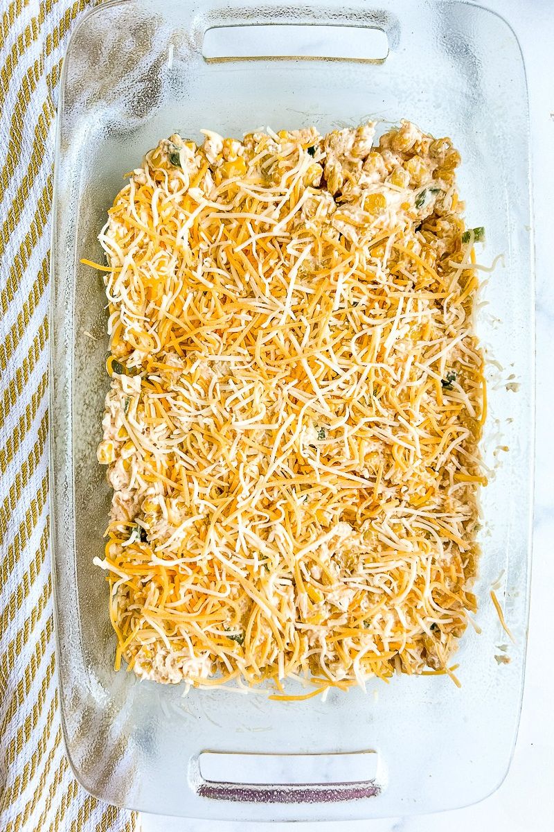 Unbake corn dip in a baking pan.