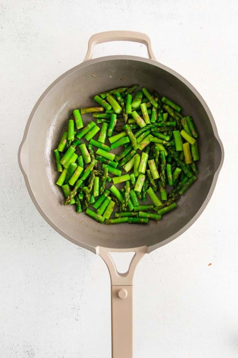 Asparagus in a sauce pan.