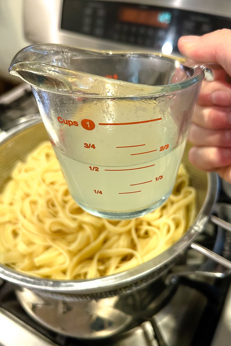 A cup of liquid for the pasta.