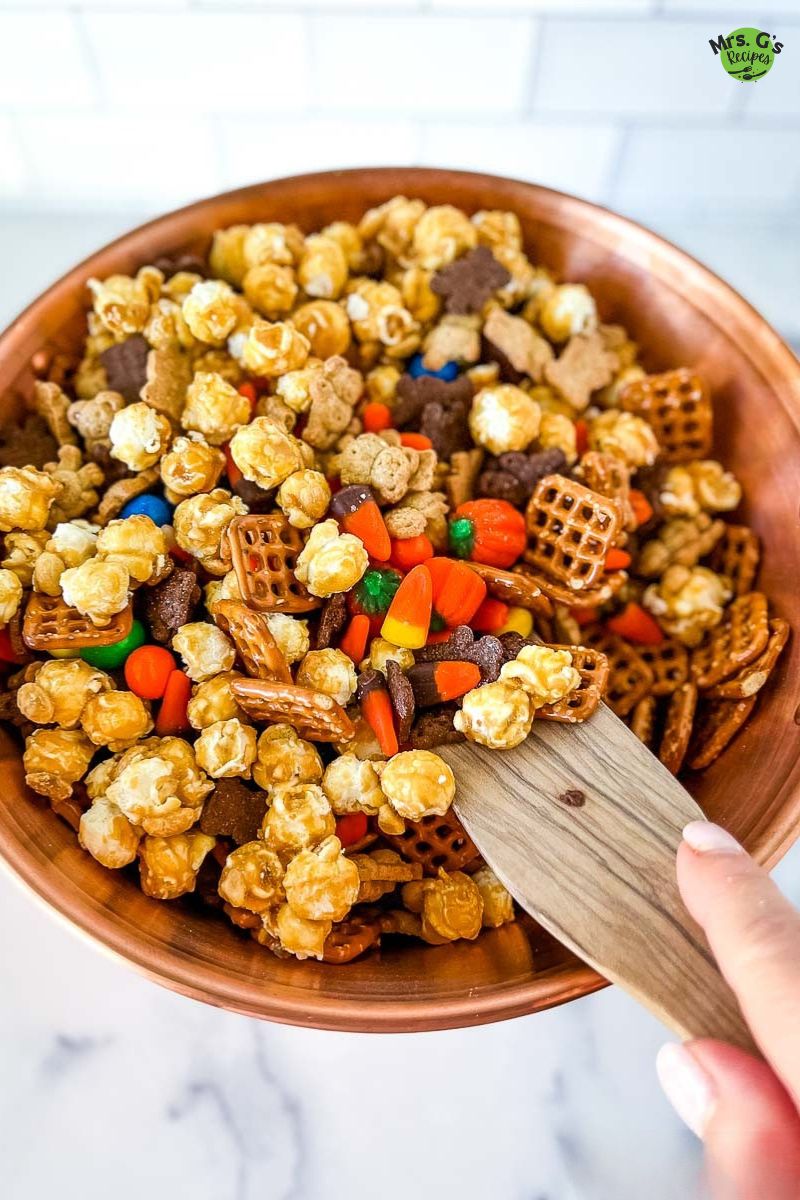 A bowl of snack mix for Halloween.