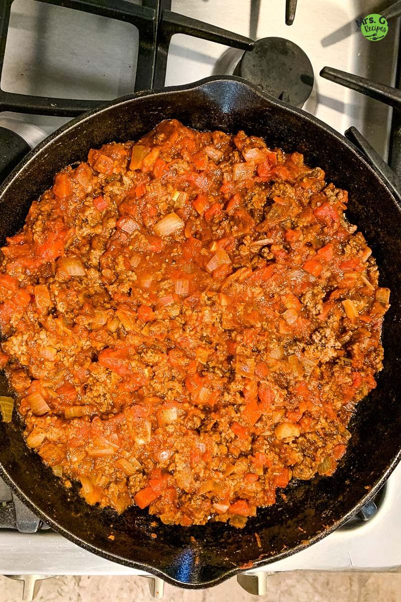 A skillet of meat mixture.