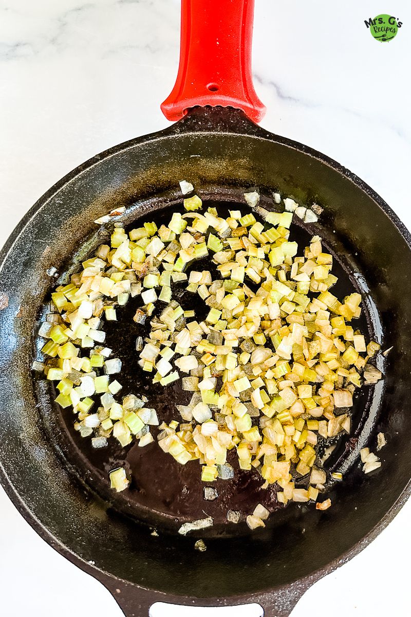 A skillet with onions.