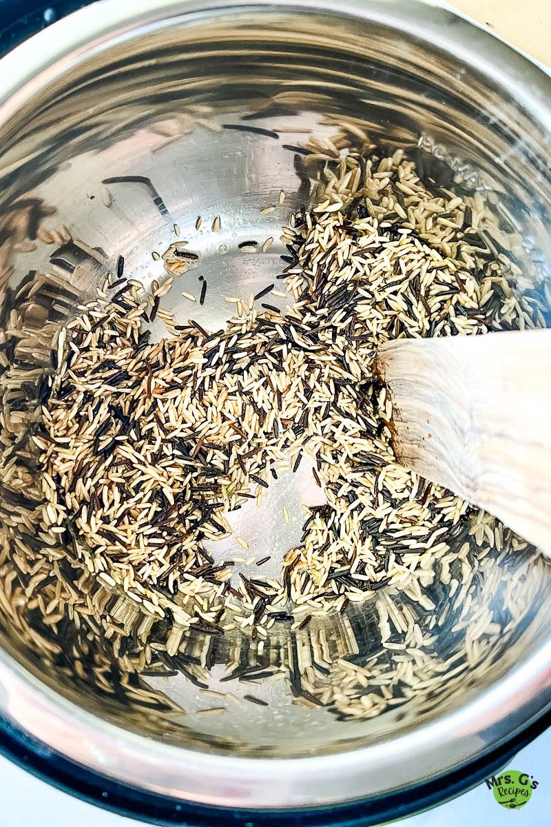 Sautéing wild rice in Instant Pot.