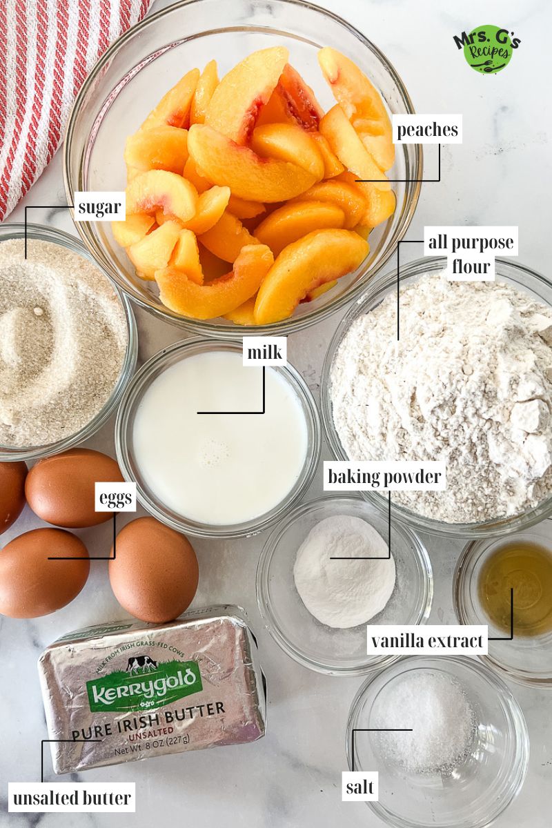Peach Cobbler Pound Cake ingredients: peaches, all purpose flour, sugar, milk, eggs, baking powder, vanilla extract, unsalted butter and salt.